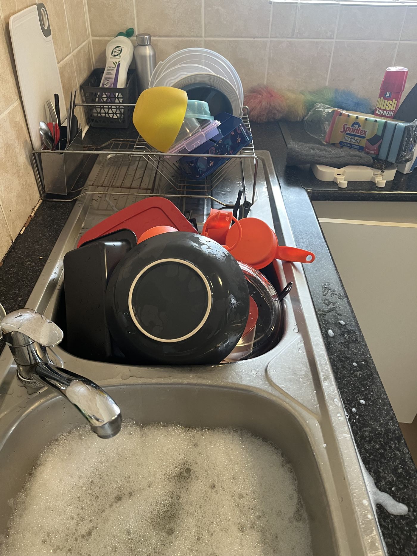 GLOMSA Group tidying a kitchen drying rack
