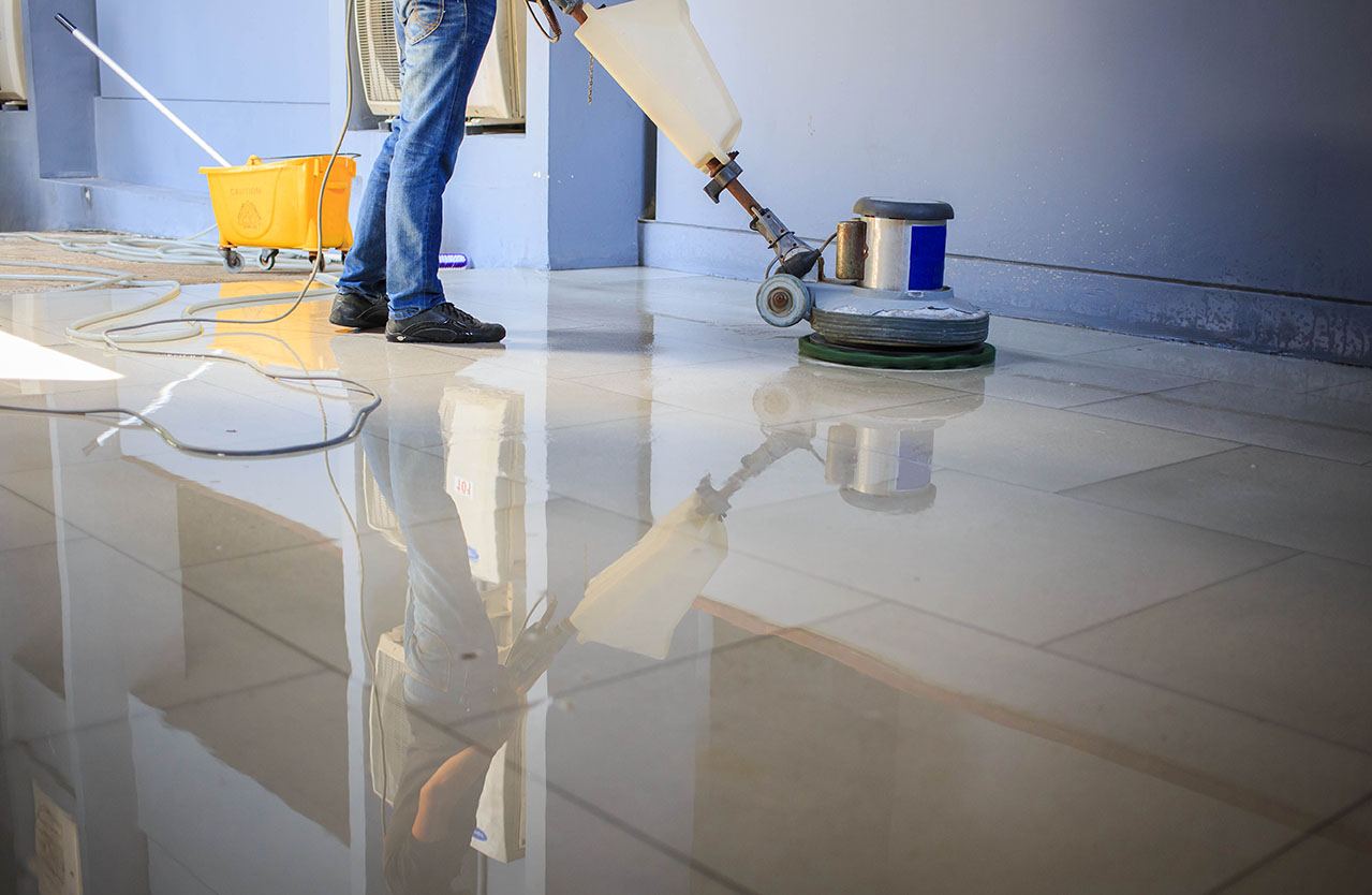 GLOMSA Group buffing a floor